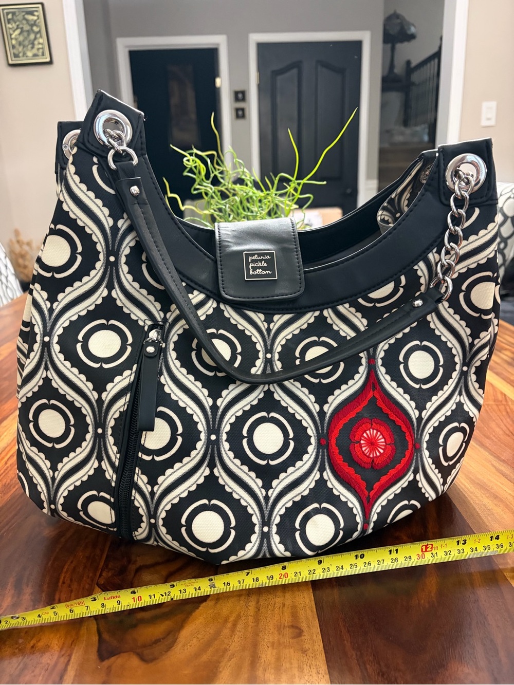 Petunia Pickle Bottom Black, Cream and Red Patterned Shoulder diaper bag Hobo